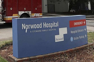 The sign for Norwood Hospital, a Steward Health Care hospital is seen, June 29, 2020, in Norwood, Mass. Steward Health Care said it plans to sell off all its hospitals after announcing on Monday, May 6, 2024, that it filed for bankruptcy protection. (AP Photo/Steven Senne, File)